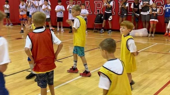 Mighty Ants scrimmage day against the Warriors youth program with families courtside (Fall 2024)
